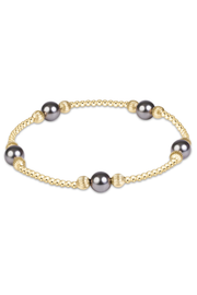 Purpose Pearl Dark Grey 6mm Dignity Gold Bracelet | enewton enewton